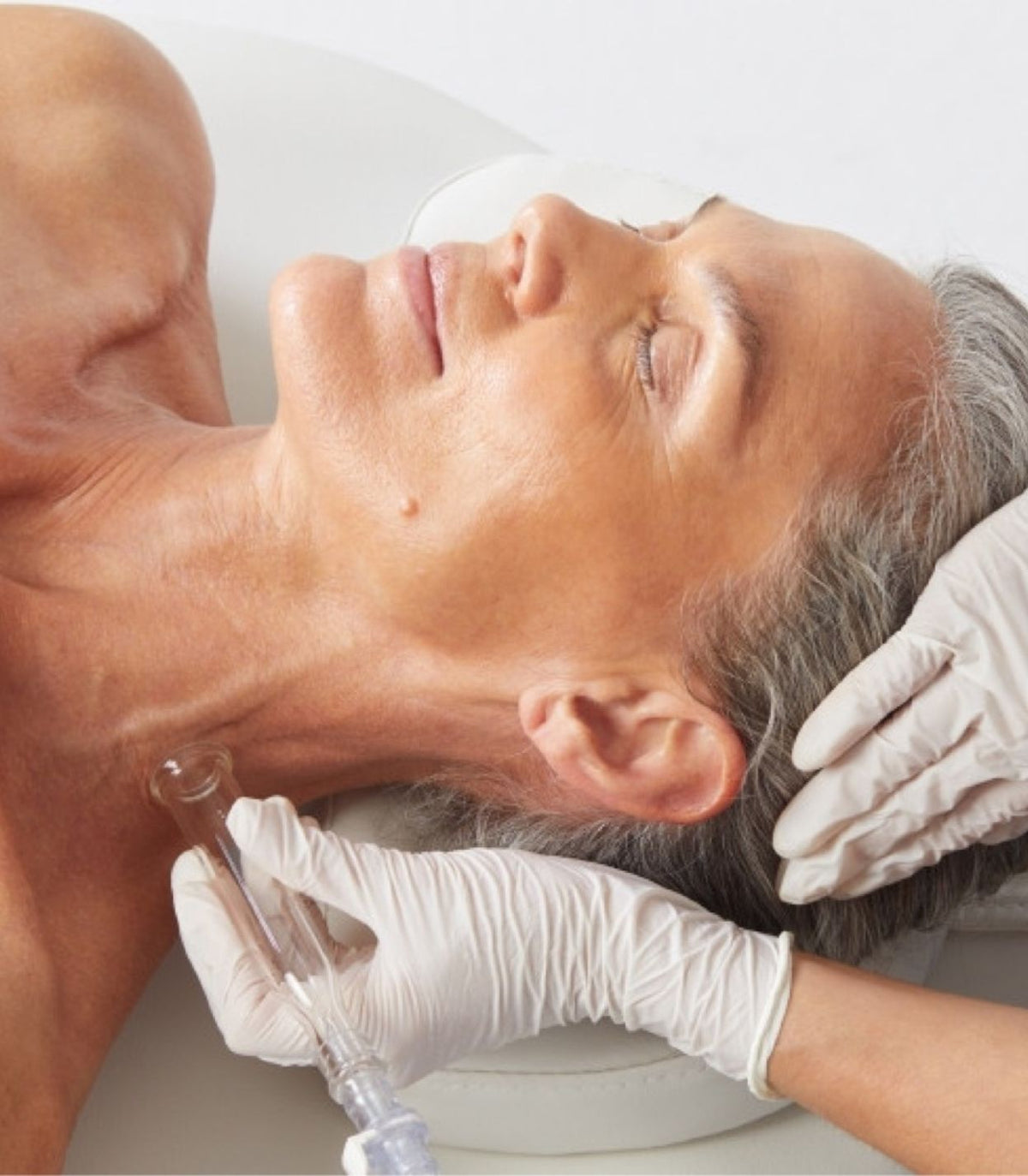 HydraFacial Lymphatic Drainage Therapy treatment reducing puffiness, promoting detoxification, and improving circulation for radiant skin